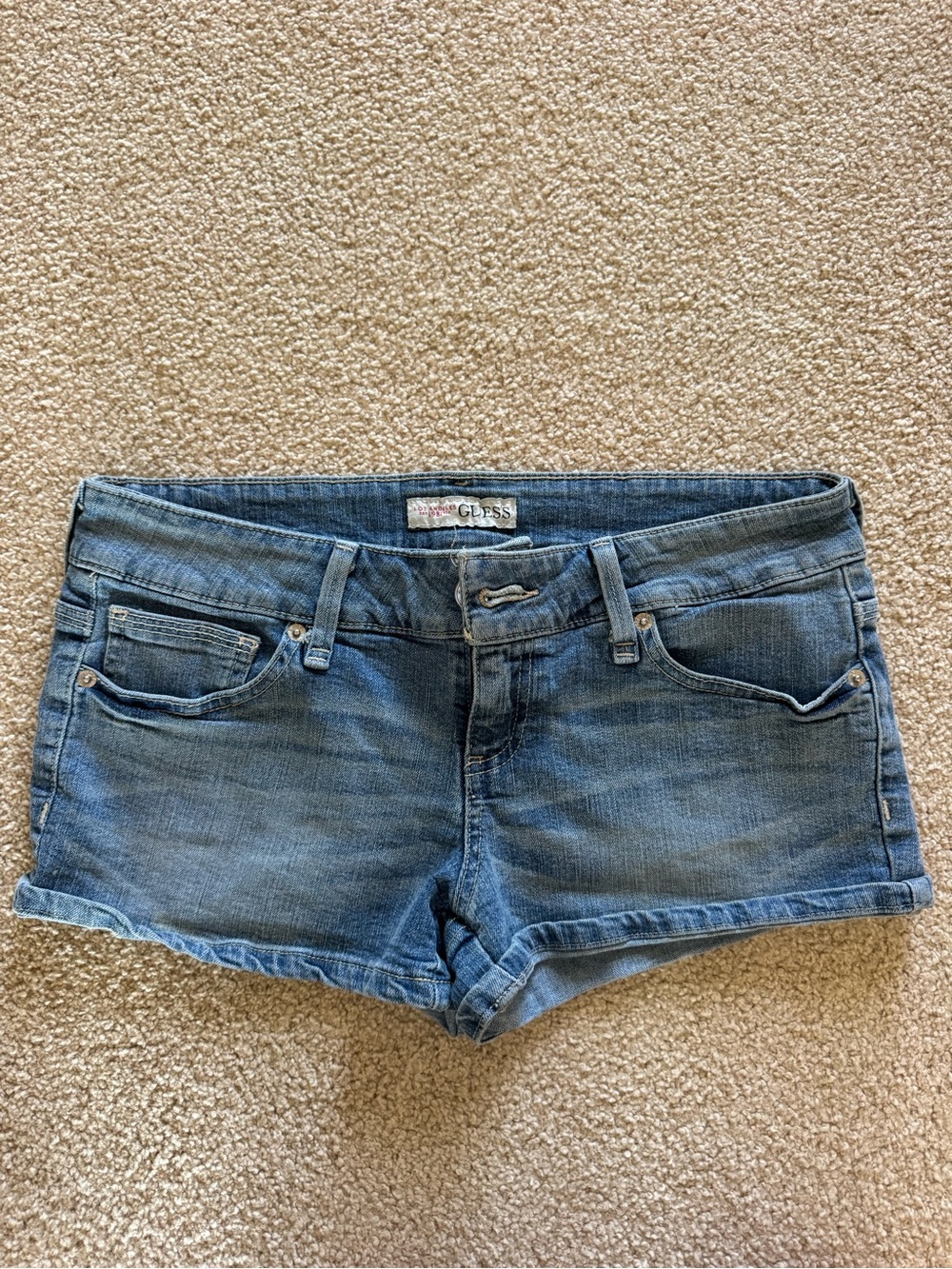 GUESS Vintage Low-Rise Denim Cutoff Shorts in Light Blue Wash